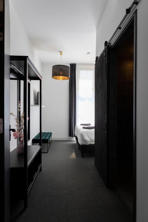 Hotel En Stadscafe De Dam L Hotel 莫尼肯达姆 外观 照片