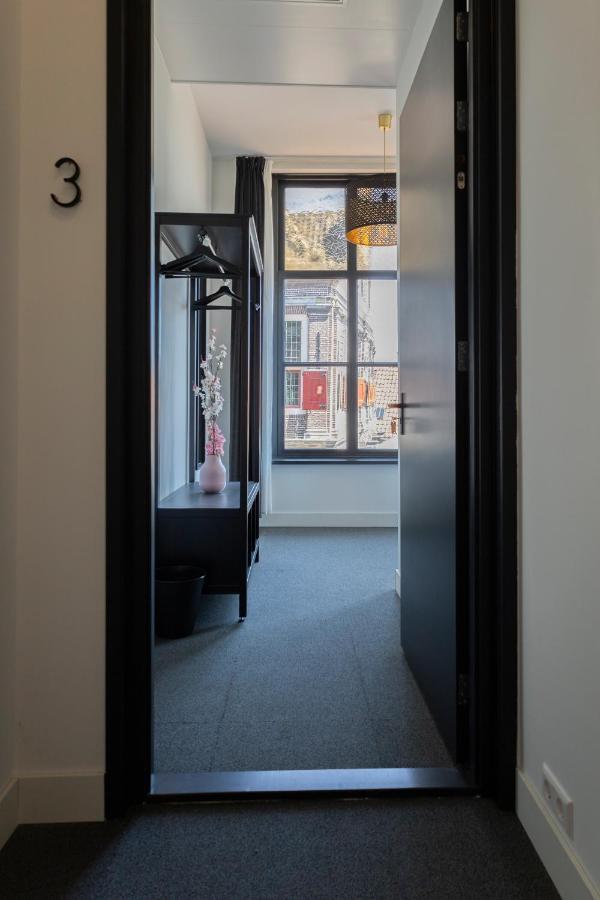Hotel En Stadscafe De Dam L Hotel 莫尼肯达姆 外观 照片